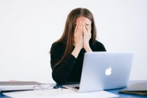 girl stressed whilst working