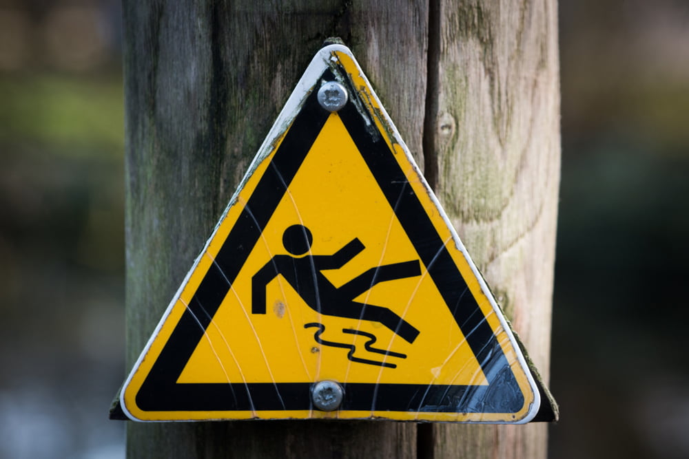 A warning sign for danger of slips