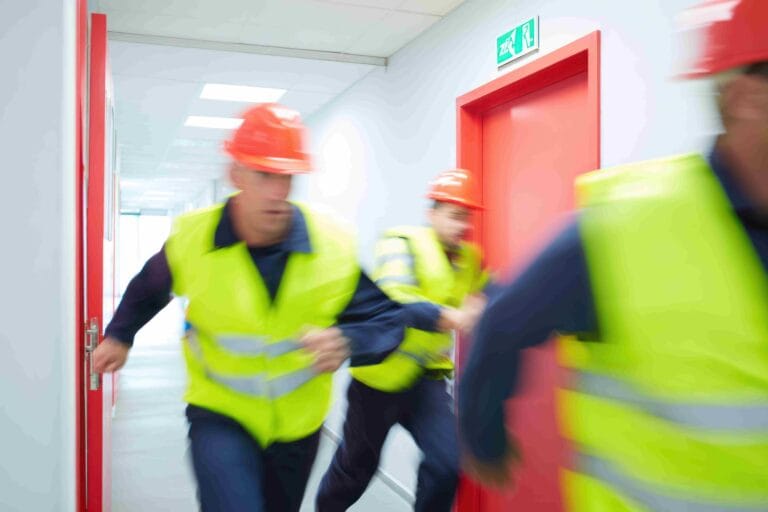 men rushing out/to workplace