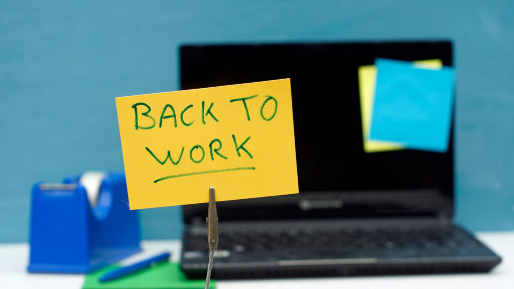 returning to work 'back to work' text on yellow face card